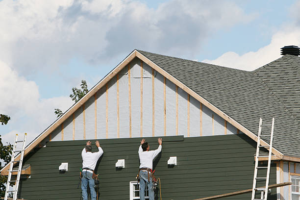 Professional Emergency Siding Repair technician working in Carle Place, NY